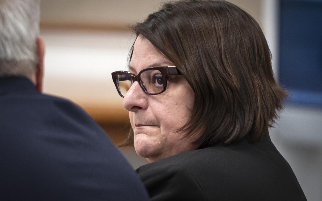 Addison County State’s Attorney Eva Vekos enters the courtroom in the Mahaney Courthouse in Middlebury on Tuesday afternoon and prepares to sit at the defendant’s table, rather than the prosecutor’s. She pleaded not guilty to a charge of driving under the influence of alcohol. Pool photos by Glenn Russell/VTDigger